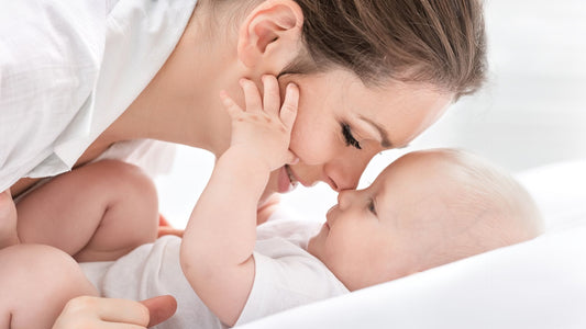 A cute mom and baby moment during babycare routine 